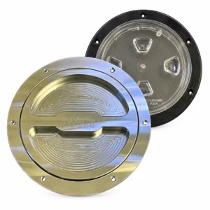 XL billet cap in front of the original clear-center Beckson cap it replaces